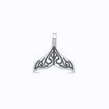 Close up of the oxidized vintage finish on the silver whale tail charm