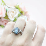 Oval Halo Split Shank Twisted Ring