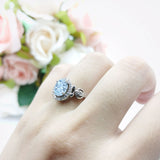 Oval Halo Split Shank Twisted Ring