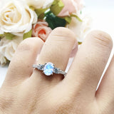 Three Stone Oval Natural Stone Trellis Ring