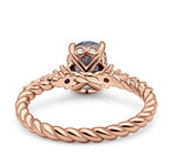 Hidden Halo Twisted Rope Oval Natural Rutilated Quartz Engagement Ring